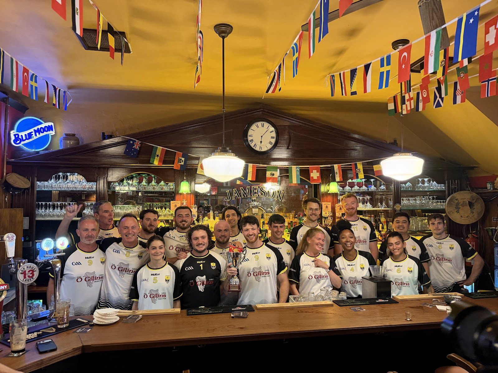 Lisbon Celtiberos squad in new McKeever jerseys outside O'Gilin's Irish Pub